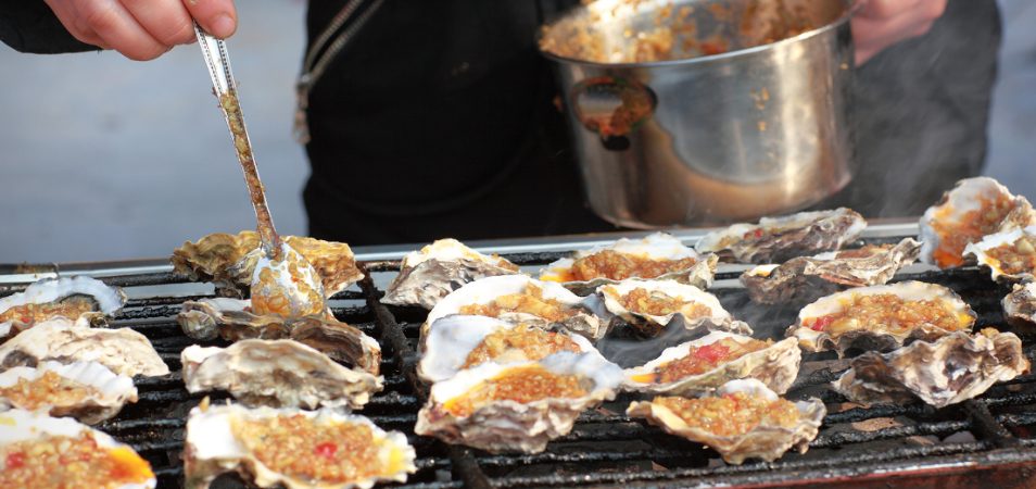 Oysters Rockefeller being prepared by a chef at Antoine's Restaurant in New Orleans. 