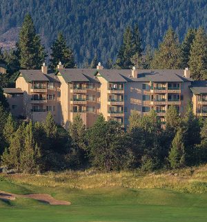 Tall trees surrounding a large resort with a golf course in Oregon at the Worldmark Running Y.