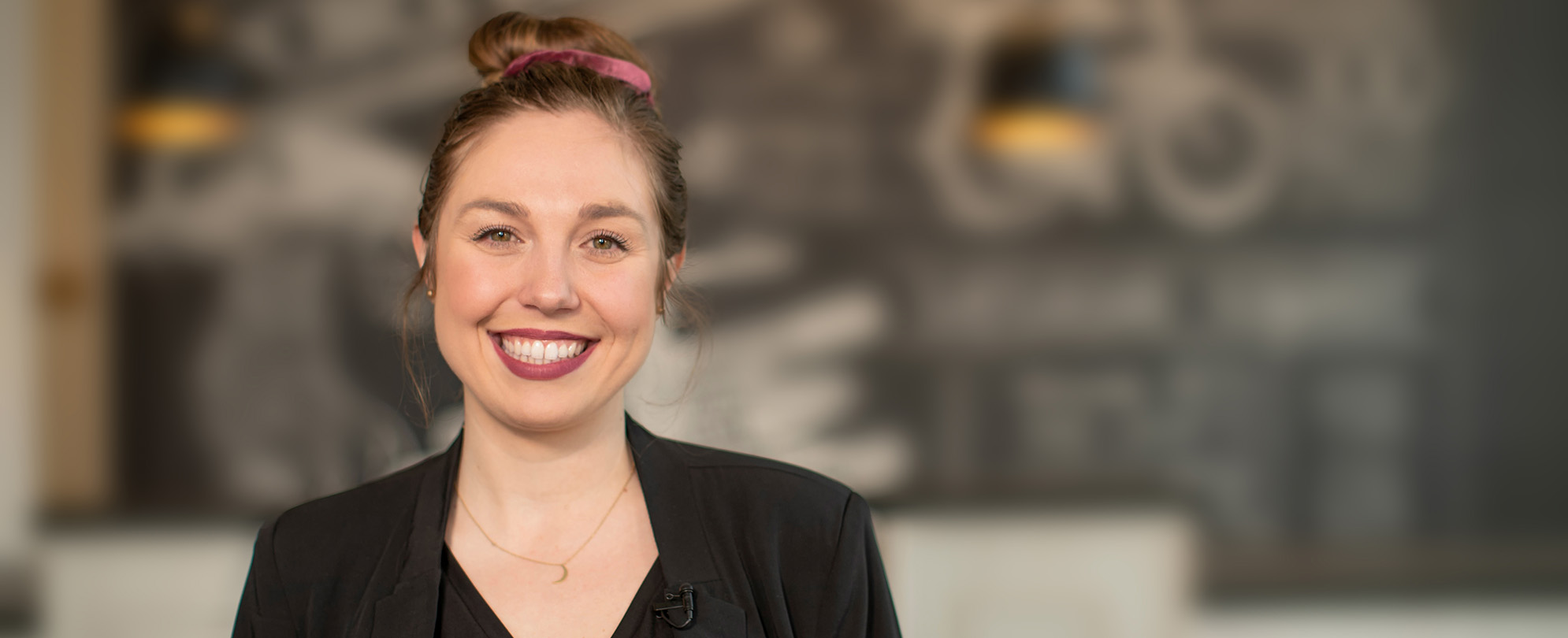 A smiling female WorldMark team member.